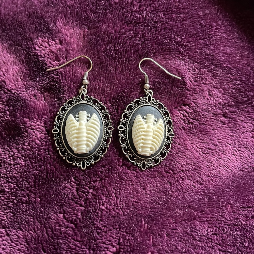 Skeleton torso earrings